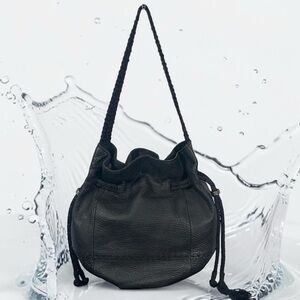 SAK Black Leather Hobo Handbag Beaded Tassel